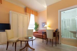Posezení v ubytování Hotel Pallanza by LVG Hotel Collection