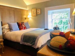 Voodi või voodid majutusasutuse Avalon House Hotel toas