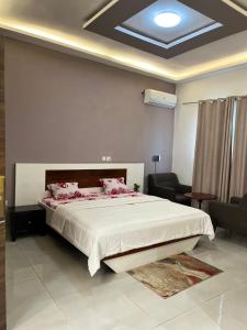 Postel nebo postele na pokoji v ubytování Souad Résidence