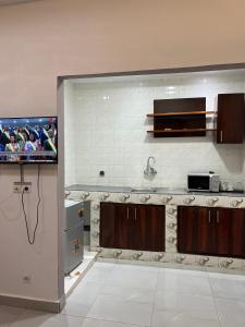 Kuchyň nebo kuchyňský kout v ubytování Souad Résidence + 29 fotografií