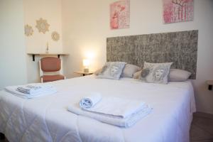 Postel nebo postele na pokoji v ubytování House turkish scale- benvenuti al sud + 63 fotografií