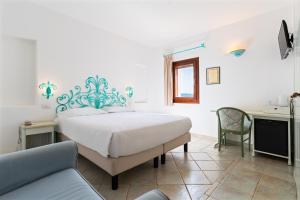 TV a/nebo společenská místnost v ubytování Hotel Villa Gemella