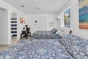 Postel nebo postele na pokoji v ubytování Boho Studio in Little Havana