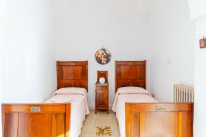 A bed or beds in a room at Villa Isabella
