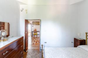A bed or beds in a room at Villa Isabella
