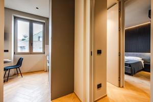 A bed or beds in a room at Luxury Suite with View Steps from the Duomo
