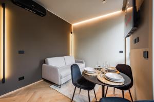 A seating area at Luxury Suite with View Steps from the Duomo