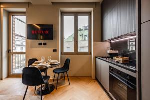 A kitchen or kitchenette at Luxury Suite with View Steps from the Duomo