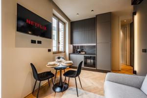 A seating area at Luxury Suite with View Steps from the Duomo