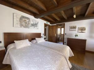 Ένα ή περισσότερα κρεβάτια σε δωμάτιο στο Casa El Molín 3 Soto de Dueñas