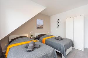 Postel nebo postele na pokoji v ubytování Geräumige Wohnung in Baesweiler für 7 Personen