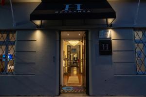 a door to a store with a sign on it at H Ocaranza in Santiago