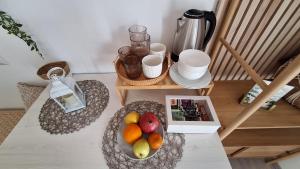 Příslušenství pro přípravu čaje a kávy v ubytování Apartments Teo 1