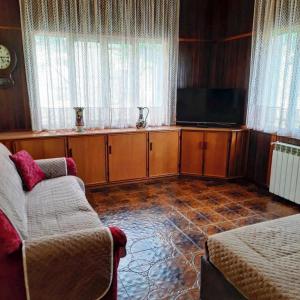 TV a/nebo společenská místnost v ubytování Casa Vacanze Domus Angela