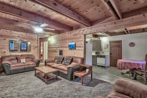 a living room with two couches and a table at Cholula Chalet 811C in South Lake Tahoe