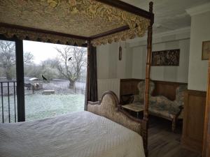 Postel nebo postele na pokoji v ubytování B&B Le Relais de Charlinette