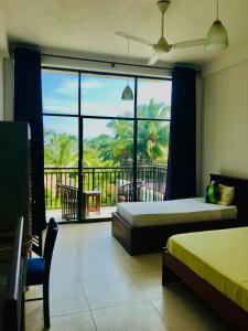 カルクダにあるAqua Marine Beach Hotelのギャラリーの写真