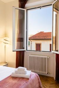 Ένα ή περισσότερα κρεβάτια σε δωμάτιο στο Loft in Gavinana-Uguccione