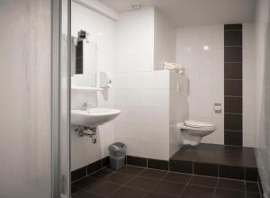 Koupelna v ubytování Hotel & Appartementen - De Zeven Heuvelen + 19 fotografií