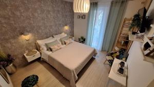 Postel nebo postele na pokoji v ubytování Apartments Teo 1