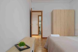 Ένα ή περισσότερα κρεβάτια σε δωμάτιο στο Apartamento San Millan Confort