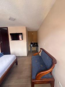 Postel nebo postele na pokoji v ubytování Hotel Casa Colonial Montufar
