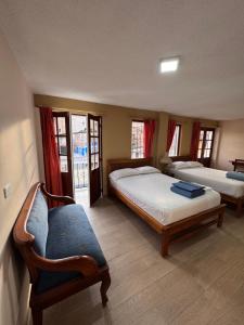 Postel nebo postele na pokoji v ubytování Hotel Casa Colonial Montufar
