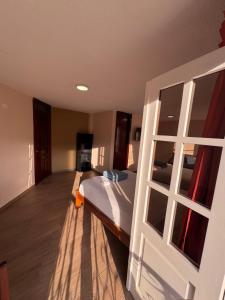 Postel nebo postele na pokoji v ubytování Hotel Casa Colonial Montufar