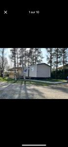 a picture of a building on the side of a road at Mobil home in Onzain