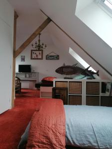 Postel nebo postele na pokoji v ubytování Chez Hortense 56
