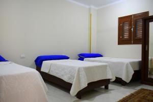 Amoaj hotel فندق امواج客房内的一张或多张床位