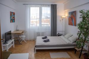 Posteľ alebo postele v izbe v ubytovaní Practical flat Nivy centre