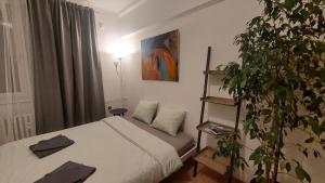 Posteľ alebo postele v izbe v ubytovaní Practical flat Nivy centre