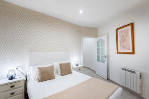 Posteľ alebo postele v izbe v ubytovaní Apartamento 2 habitaciones 140m de playa Caneliñas, P Baja-001