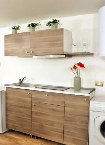 Køkken eller tekøkken på Appartamento In Piazza