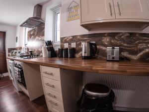 Kuchyň nebo kuchyňský kout v ubytování SAV Stays Apartments Rutland Leicester