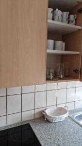 Η κουζίνα ή μικρή κουζίνα στο Zimmer E +8 φωτογραφίες