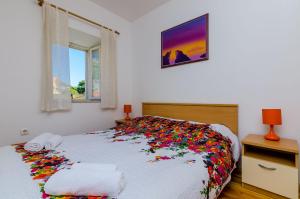 Posteľ alebo postele v izbe v ubytovaní Orka Apartments