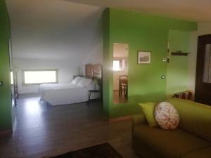 Voodi või voodid majutusasutuse B&B Books & Bikes toas