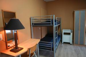 Letto o letti in una camera di YOUR HOSTEL midi station