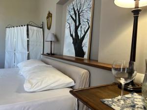 Postel nebo postele na pokoji v ubytování B&B La Casetta degli Aranci