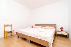 Postel nebo postele na pokoji v ubytování Rooms Karla