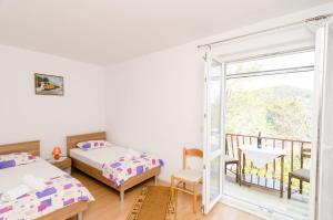 Postel nebo postele na pokoji v ubytování Rooms Karla