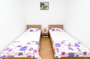 Postel nebo postele na pokoji v ubytování Rooms Karla