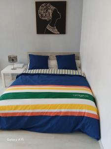 Posteľ alebo postele v izbe v ubytovaní Jolie appartement