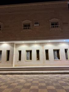 a building with many windows at Starlight AlUla in Al-ʿUla