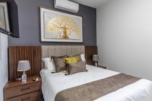 Postel nebo postele na pokoji v ubytování Pequeño espacio, gran lujo en Zapotlanejo Suite 304