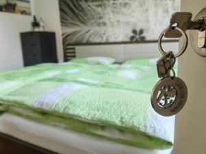 Postel nebo postele na pokoji v ubytování Gästehaus Arkona