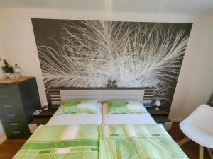 Postel nebo postele na pokoji v ubytování Gästehaus Arkona
