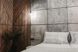 Postel nebo postele na pokoji v ubytování Loft Centr